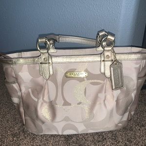 Gold coach bag